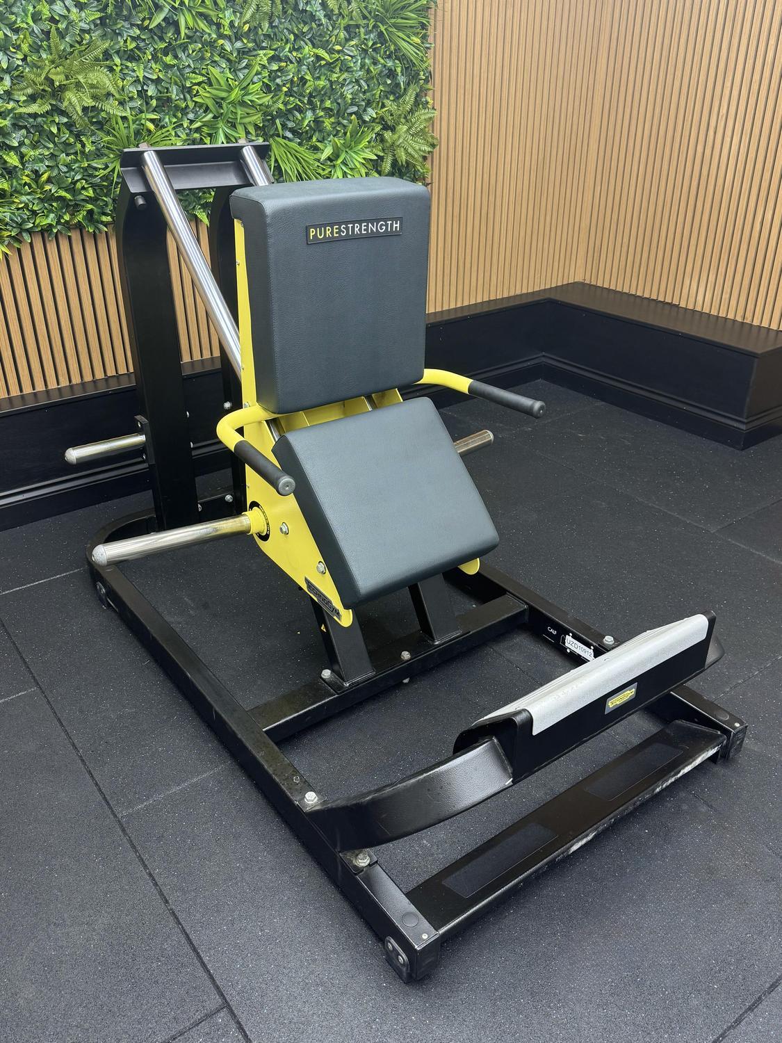 Technogym PURE STRENGTH Calf Machine (MG4500) Black/Yellow